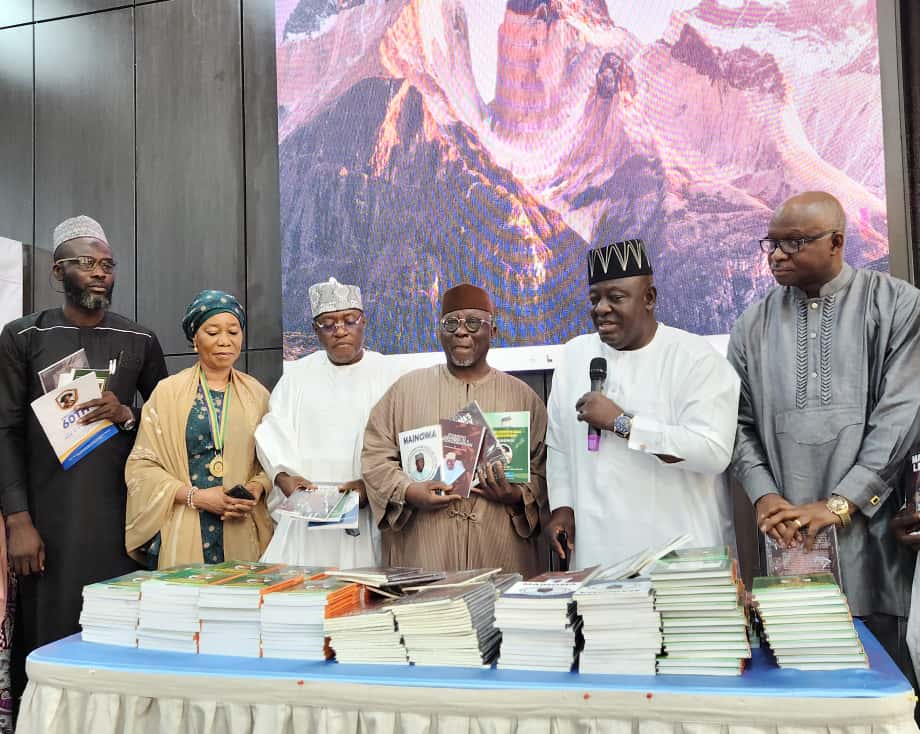 Former Nasarawa State Governor, Senator Tanko Al-Makura (Third from right); Accountant-General of Nassarawa State, Dr Musa Ahmed (Third from left); All Progressives Congress Chairman in Nasarawa State, Dr Aliyu Bello (Second from right); and other stakeholders during the unveiling of four books to celebrate the colloquium/ 60th birthday of Professor Muhammad Akaro Mainoma, on Thursday in Abuja